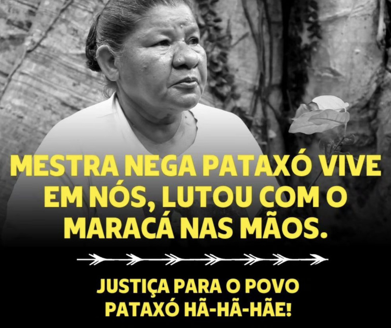 Gedenkposter der getöteten Pataxó-Führerin Maria de Fátima Muniz Pataxó ("Nega") Erinnerungsposter für die getötete Pataxó-Führerin Maria de Fátima Muniz Pataxó („Nega“) mit Aufschrift