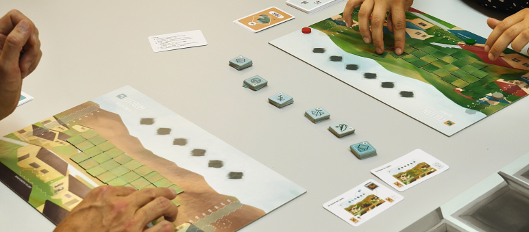 Gemeinschaftsspiel Minanga wird von zwei Spielern gespielt